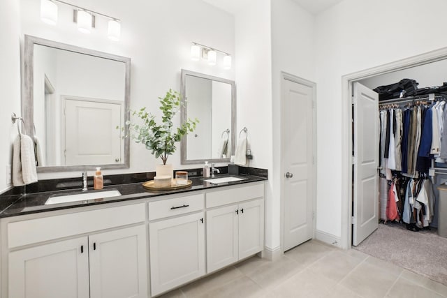 bathroom featuring tile patterned floors and vanity