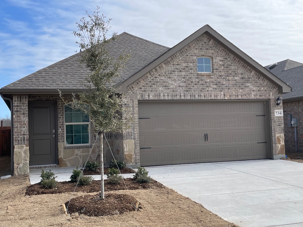 view of front of home with a garage