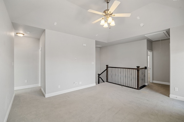 carpeted empty room with lofted ceiling and ceiling fan