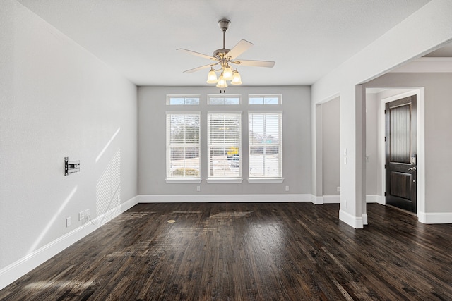 interior space featuring ceiling fan and dark hardwood / wood-style flooring