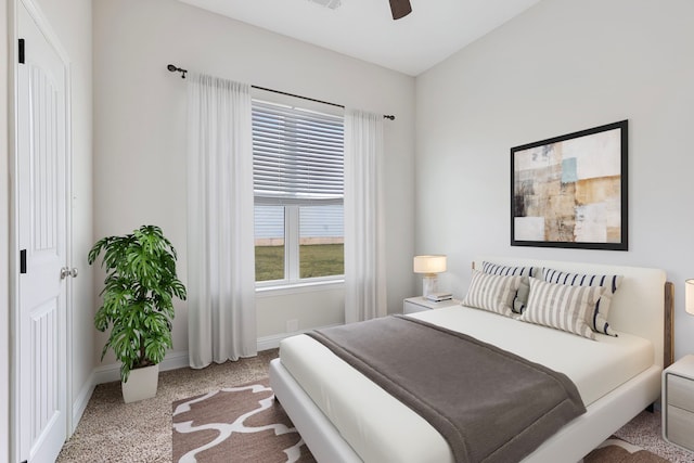 bedroom featuring ceiling fan and carpet floors