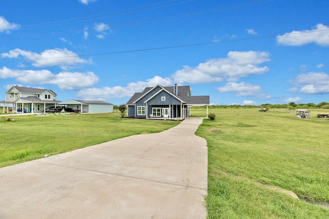 view of front of house featuring covered porch and a front lawn