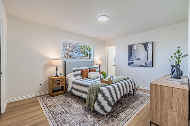 bedroom featuring wood-type flooring