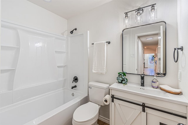 full bathroom with vanity, bathtub / shower combination, and toilet