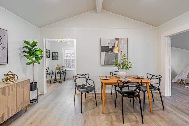 dining room featuring lofted ceiling with beams, radiator heating unit, and light hardwood / wood-style flooring