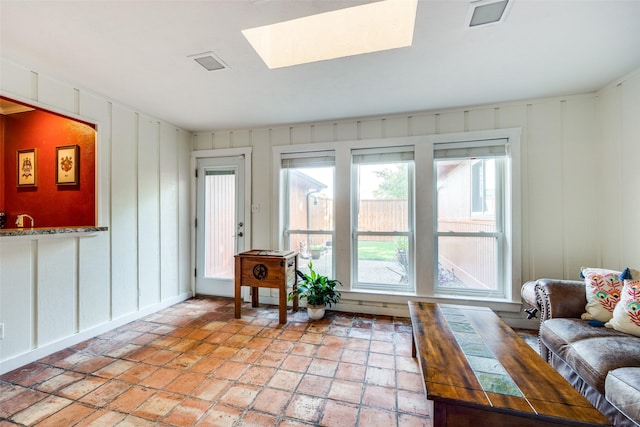 interior space featuring a skylight