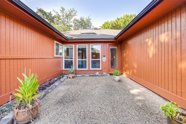 doorway to property with a patio