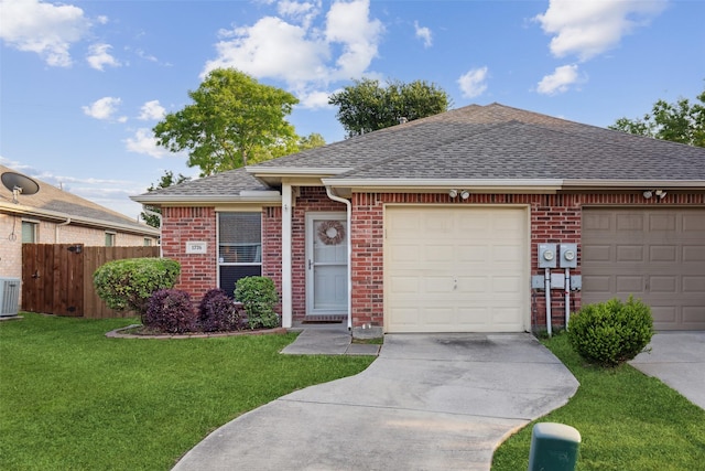 single story home with a garage, central AC, and a front yard