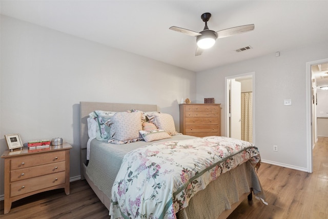 bedroom featuring hardwood / wood-style flooring and ceiling fan