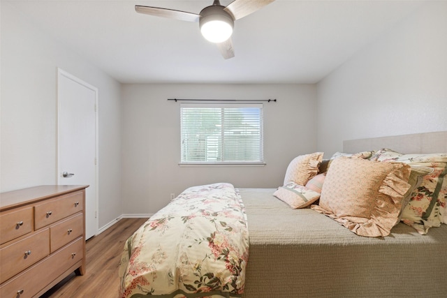 bedroom featuring ceiling fan and light wood-type flooring