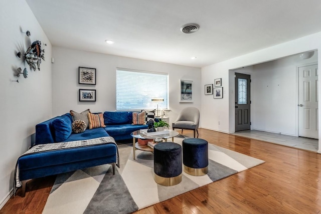 living room with wood-type flooring