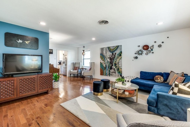 living room with wood-type flooring