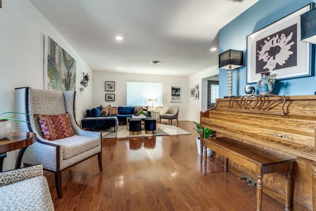 living area with wood-type flooring