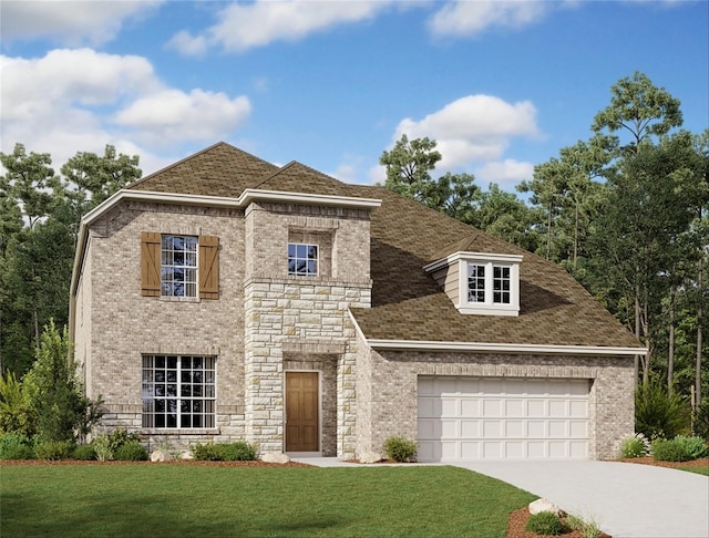 view of front of property featuring a garage and a front lawn