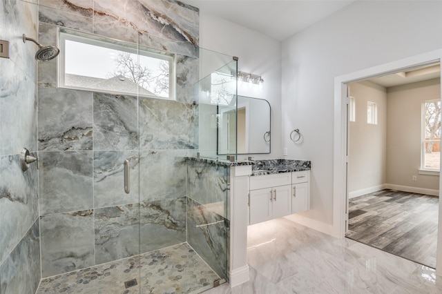 bathroom featuring vanity and walk in shower