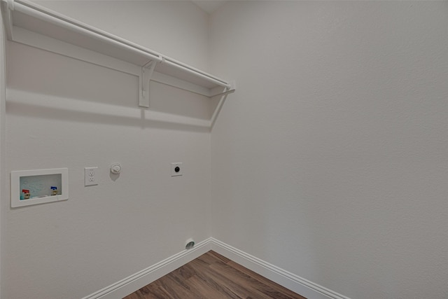 clothes washing area with electric dryer hookup, washer hookup, hardwood / wood-style flooring, and hookup for a gas dryer