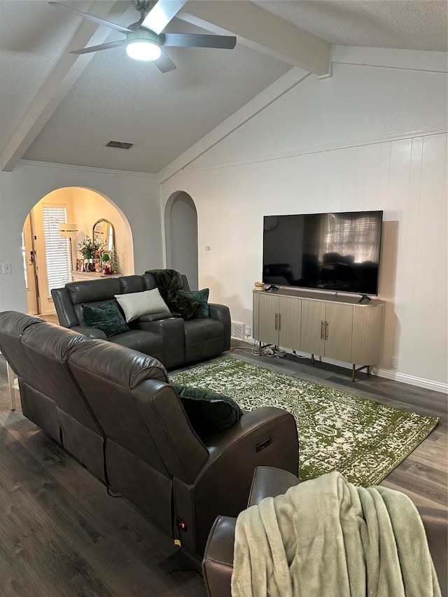 living room featuring lofted ceiling with beams, ceiling fan, and hardwood / wood-style floors