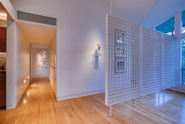 hallway featuring light hardwood / wood-style flooring