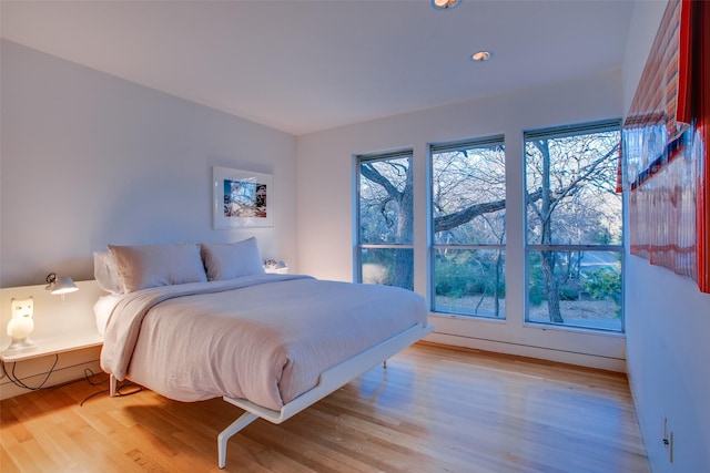 bedroom featuring light hardwood / wood-style floors