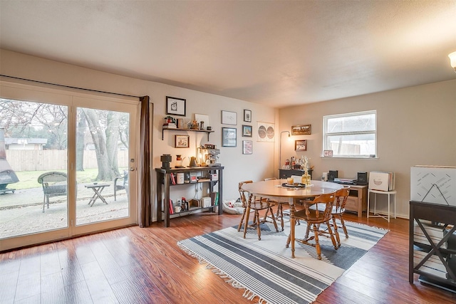 dining area with wood-type flooring