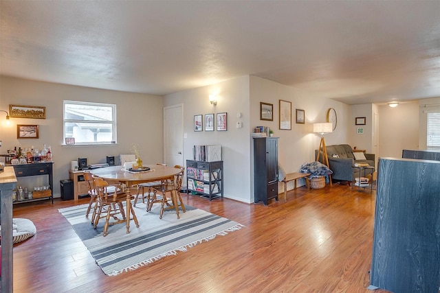 dining space featuring hardwood / wood-style floors