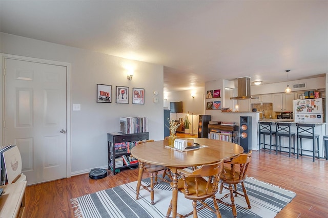 dining room featuring light wood-type flooring