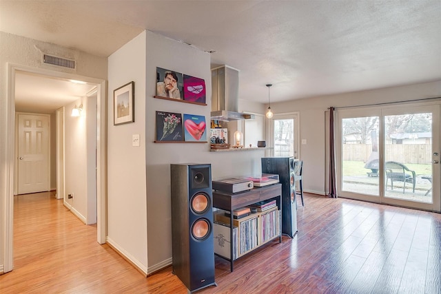 dining area with light wood-type flooring