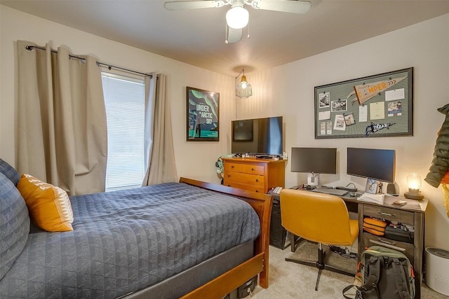 bedroom with ceiling fan and light colored carpet