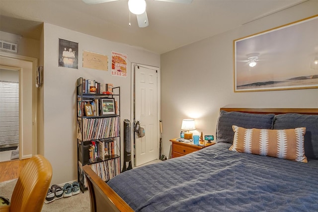 bedroom featuring ceiling fan and carpet floors