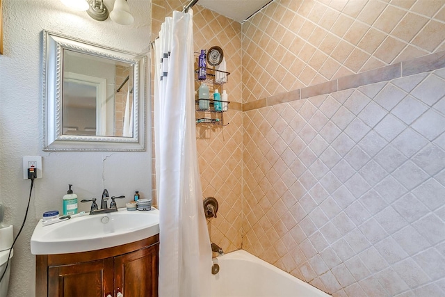 bathroom featuring vanity and shower / bath combo with shower curtain