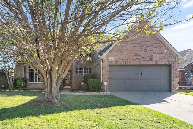 view of front of house featuring a garage and a front yard