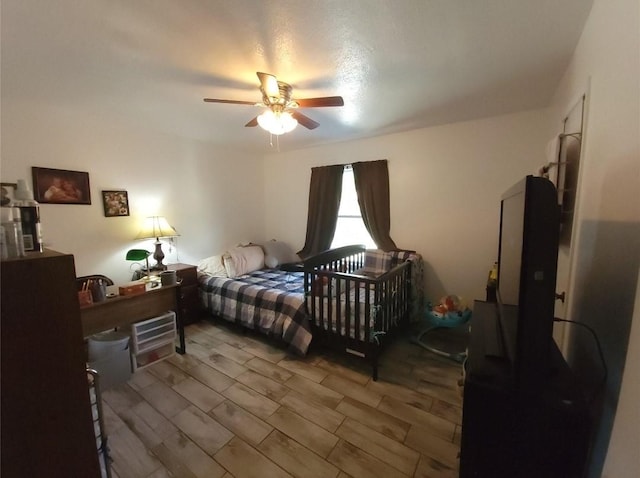 bedroom featuring ceiling fan