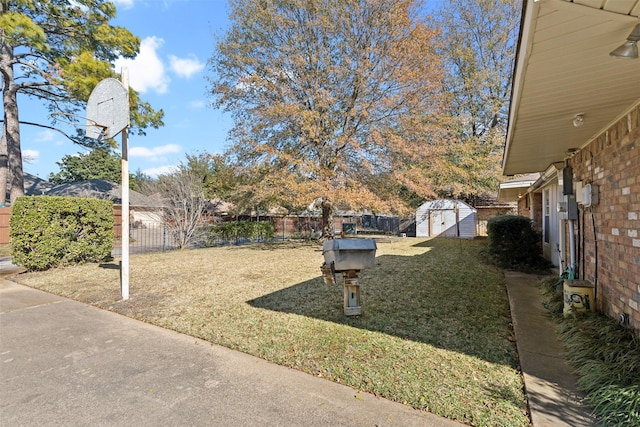 view of yard with a storage shed