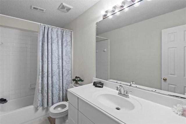 full bathroom with shower / bath combination with curtain, vanity, toilet, and a textured ceiling