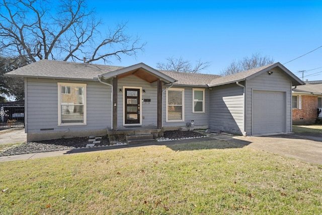 ranch-style home with a garage and a front yard