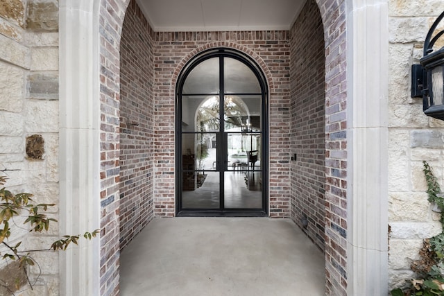 entrance to property featuring french doors