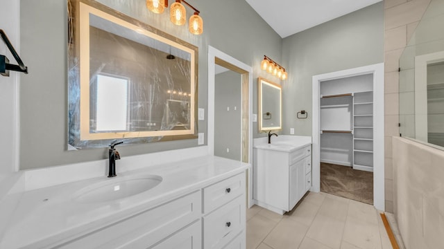 bathroom with vanity and tile patterned flooring