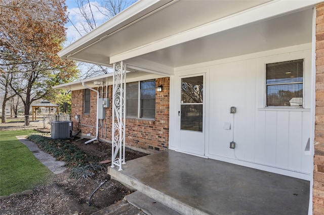 property entrance featuring central AC