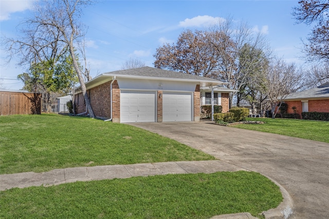 view of front of home with a garage and a front yard