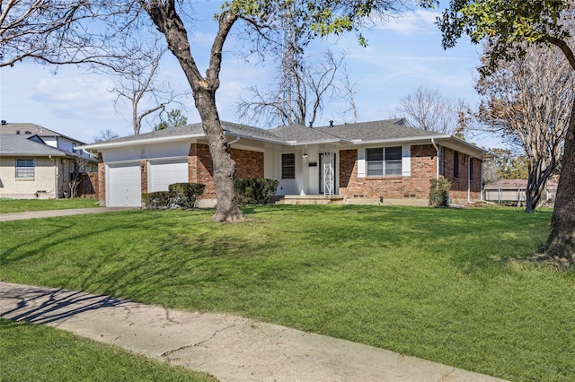 ranch-style house featuring a garage and a front yard