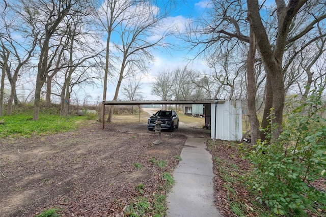 view of outdoor structure with a carport