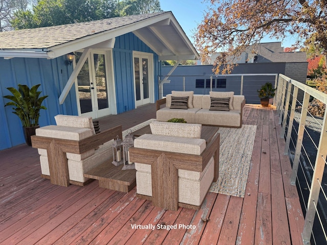 deck featuring french doors and outdoor lounge area