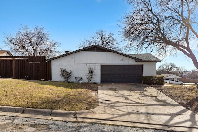 view of side of property featuring a lawn