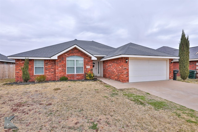 ranch-style home featuring a garage