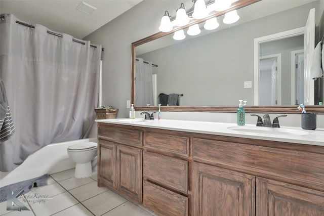 full bathroom featuring tile patterned flooring, vanity, shower / tub combo with curtain, and toilet