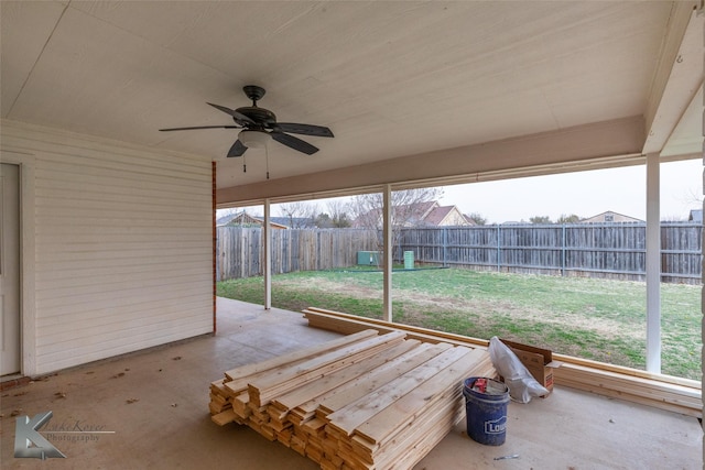 exterior space with a ceiling fan