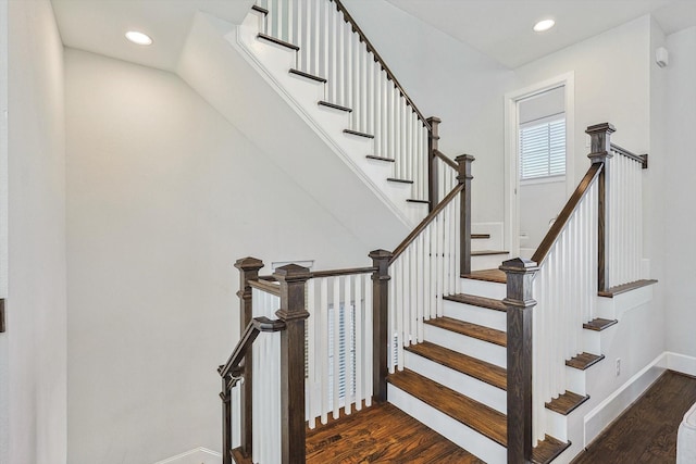 stairway featuring hardwood / wood-style floors