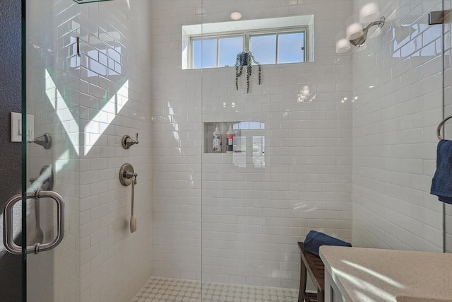 bathroom with an enclosed shower