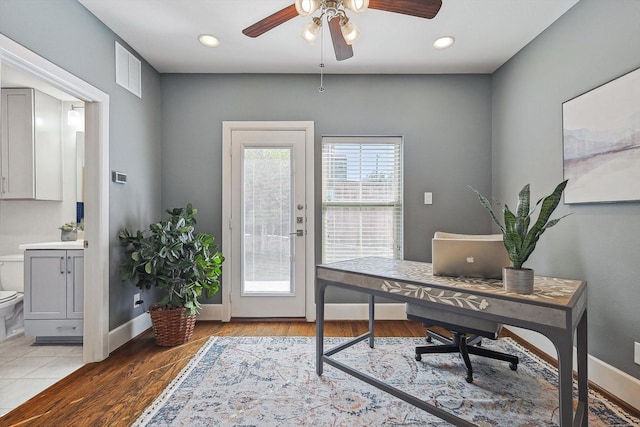 office area featuring ceiling fan and light hardwood / wood-style flooring