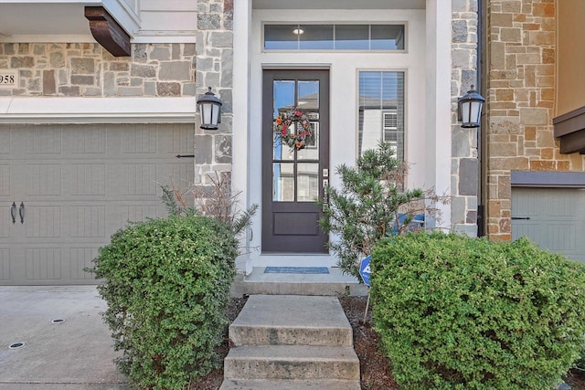 property entrance with a garage